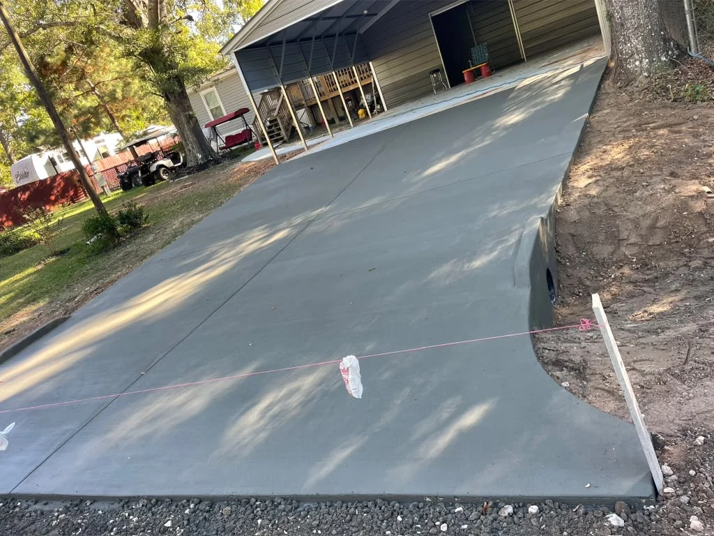 A finished concrete driveway by Santoyo’s Concrete