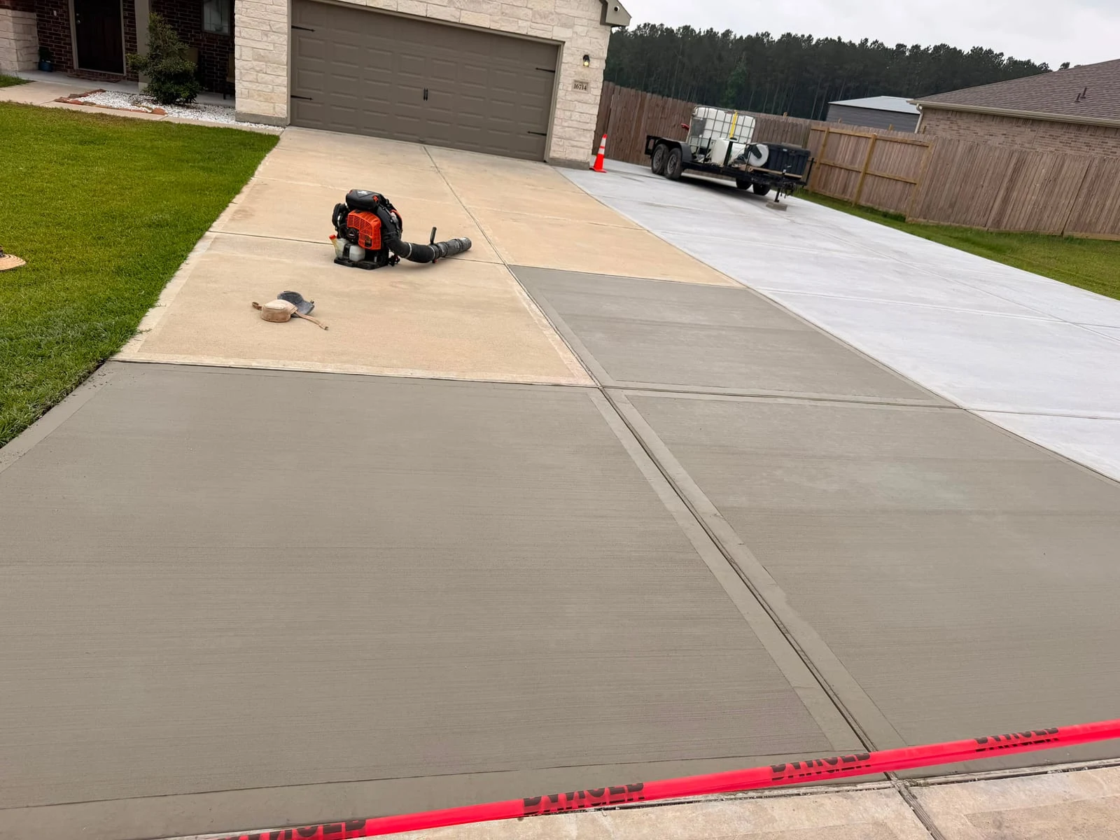 A finished concrete driveway by Santoyo’s Concrete