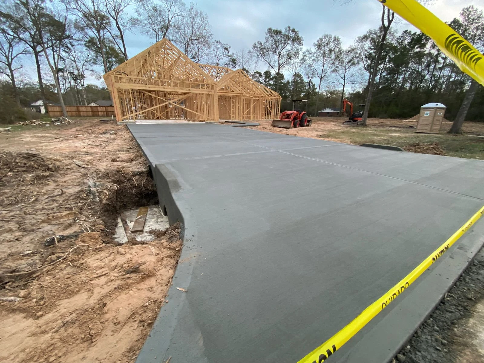 A finished concrete driveway by Santoyo’s Concrete