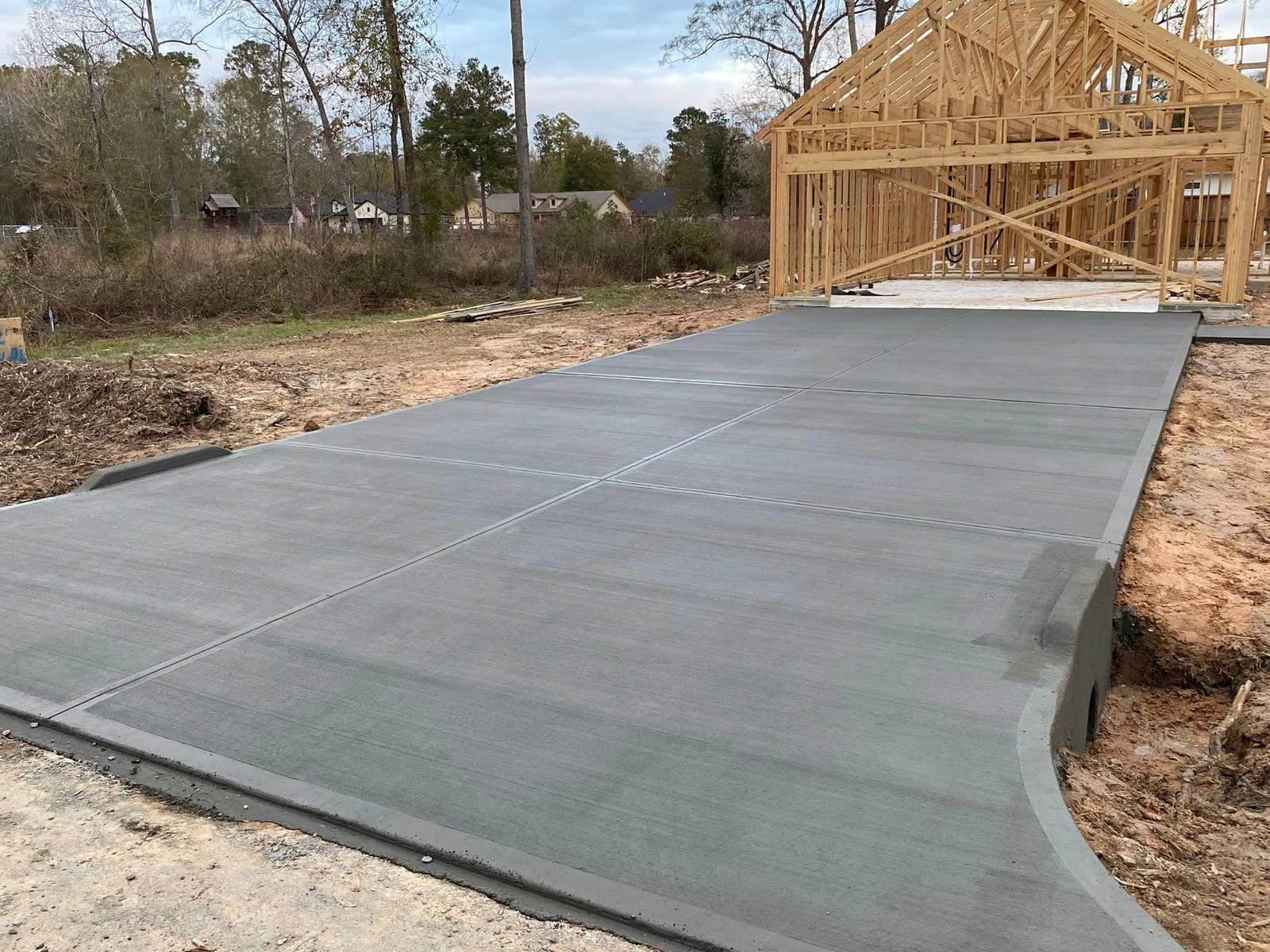 A finished concrete driveway by Santoyo’s Concrete