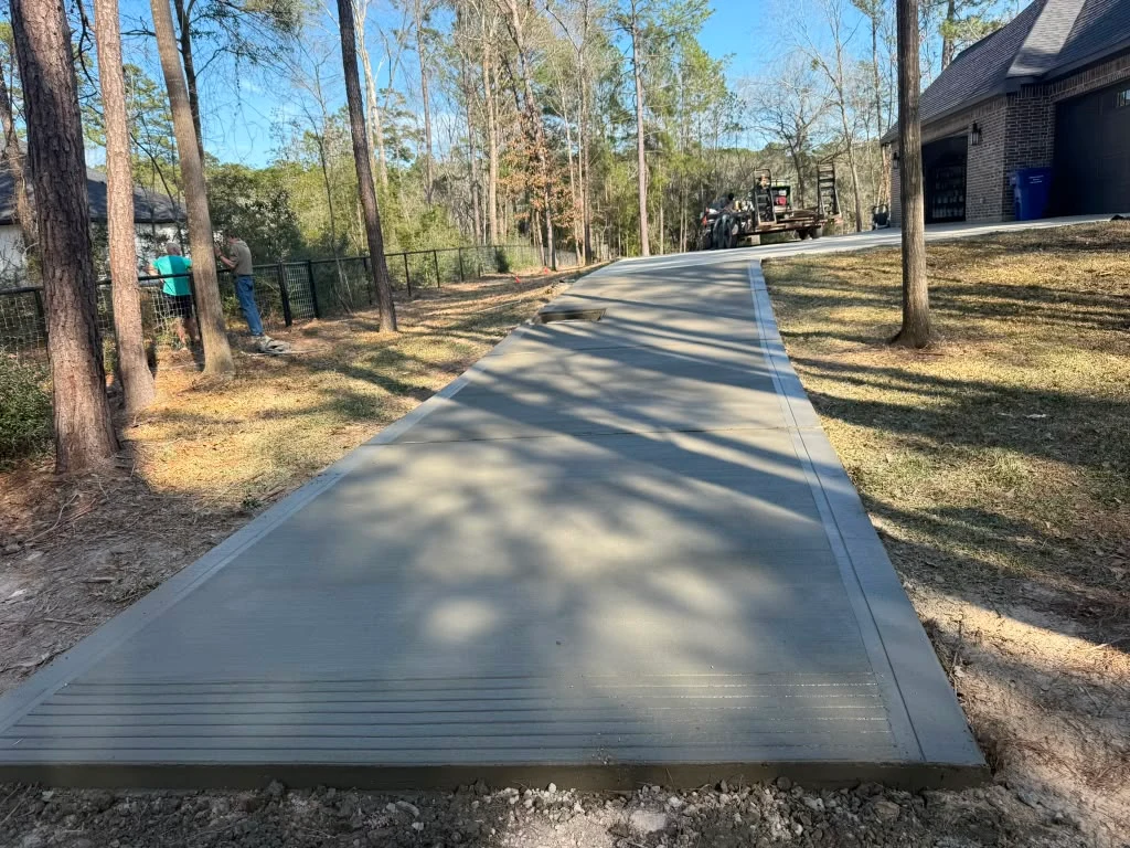 A finished concrete driveway by Santoyo’s Concrete