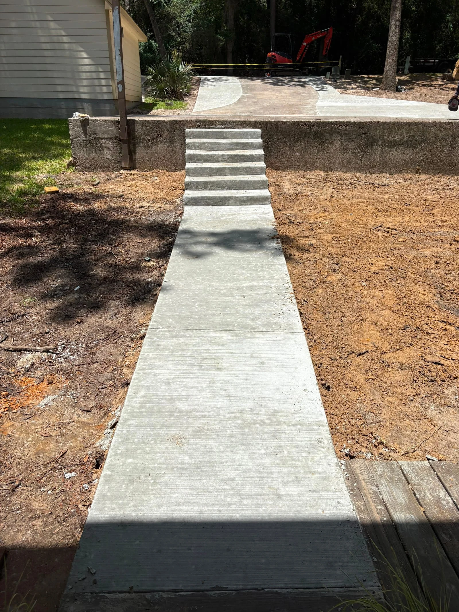 A concrete walkway by Santoyo’s Concrete