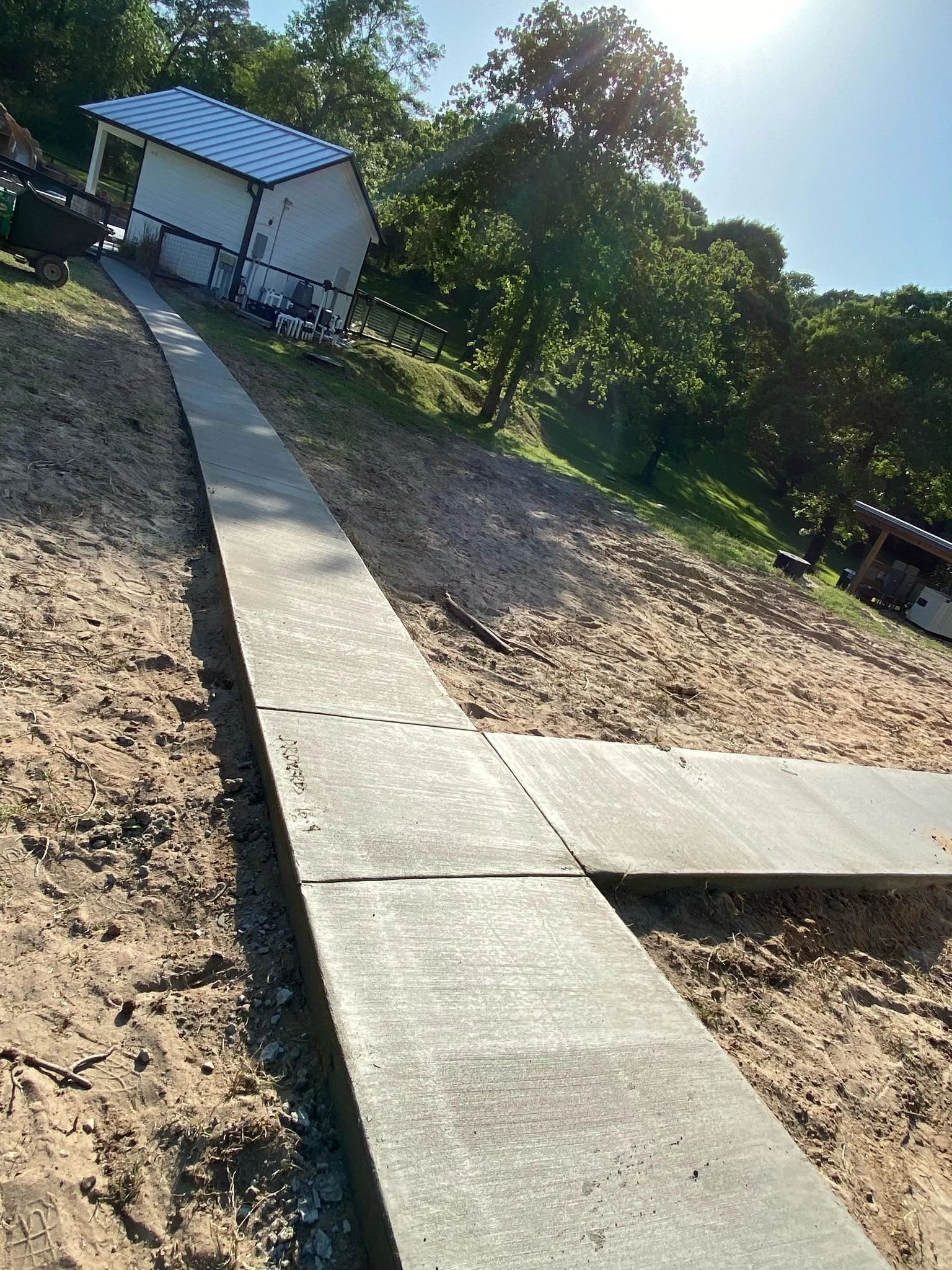 A concrete walkway by Santoyo’s Concrete