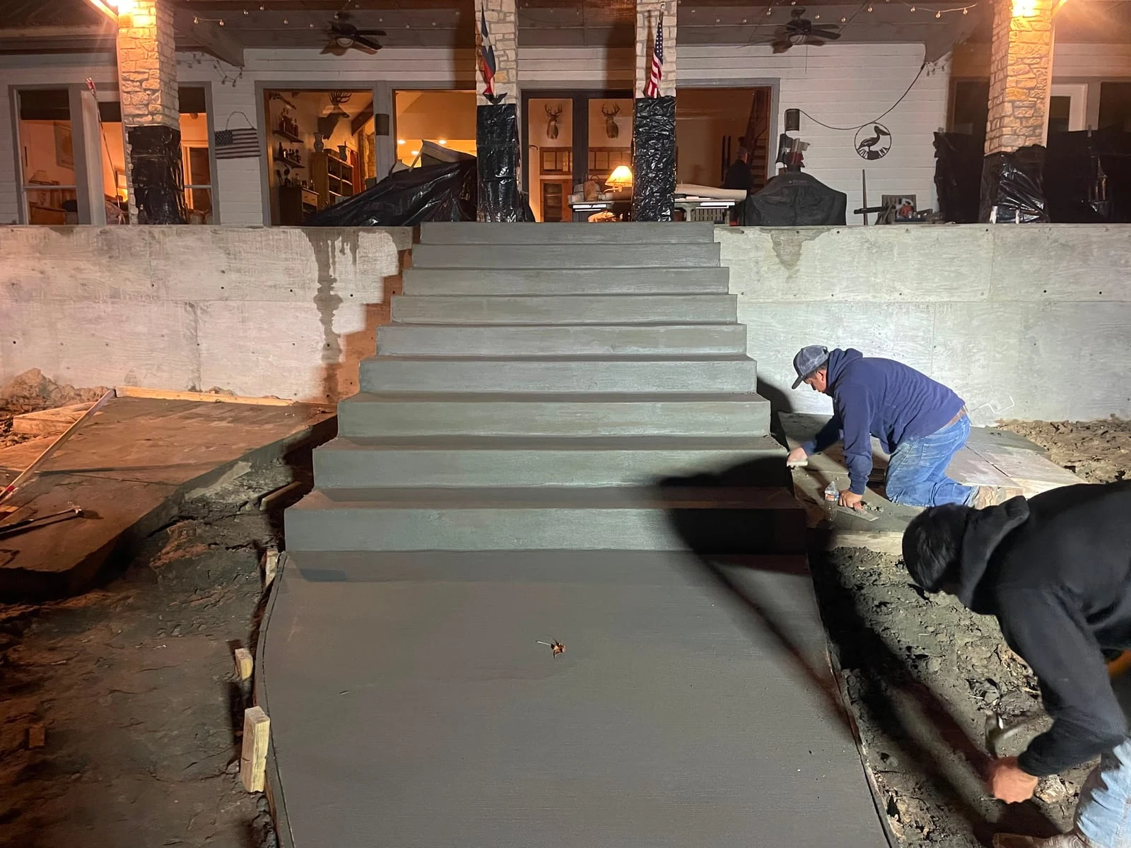 Poured concrete steps and landing by Santoyo’s Concrete