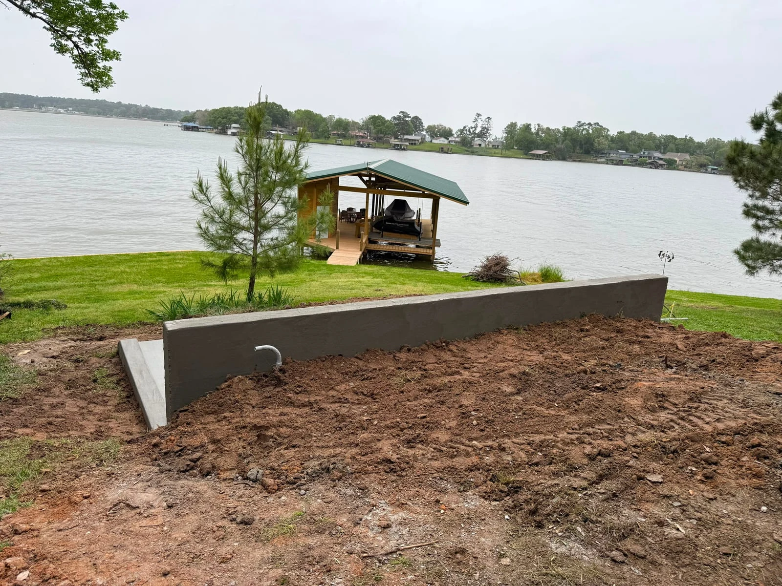 A cast-in-place concrete retaining wall by Santoyo’s Concrete